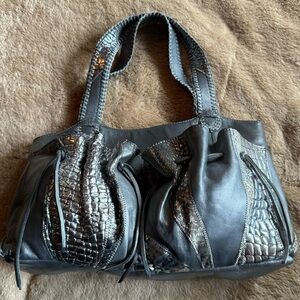 Chi by Carlos Falchi large gray lamb skin trimmed with silver accents.  New.